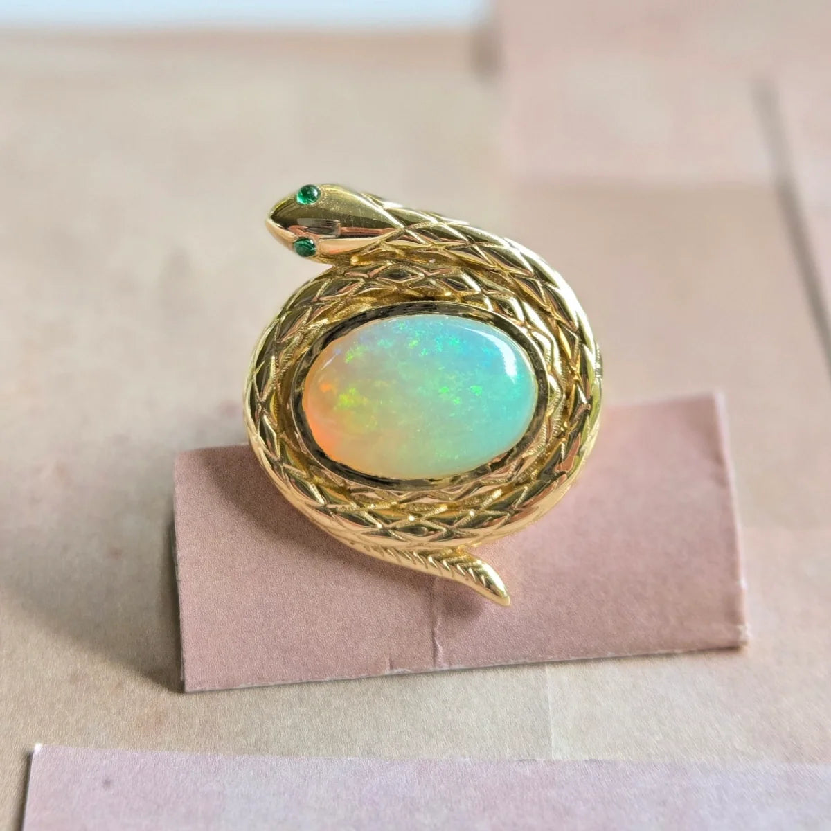 protection snake ring natural ethiopian opal emerald eyes