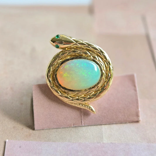 protection snake ring natural ethiopian opal emerald eyes