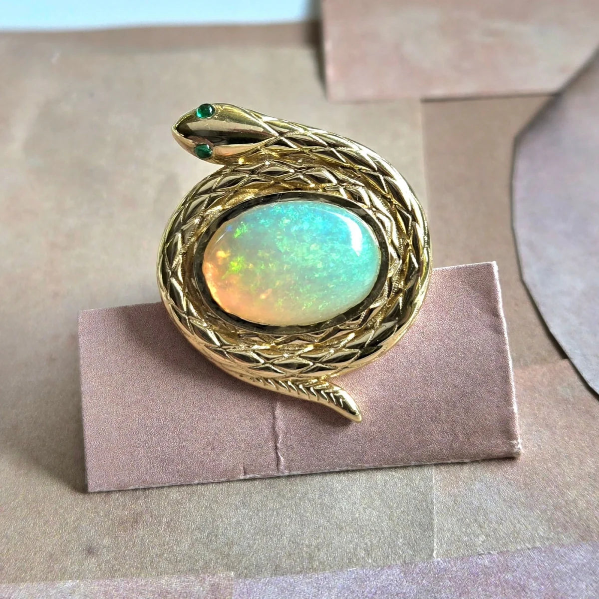 protection snake ring natural ethiopian opal emerald eyes