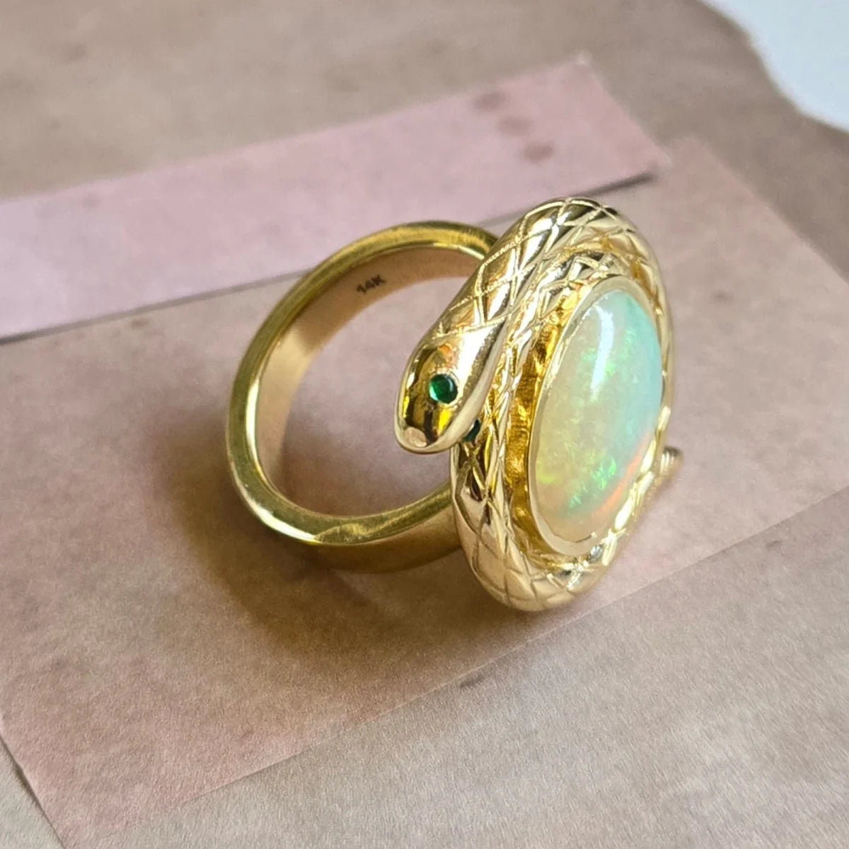 protection snake ring natural ethiopian opal emerald eyes