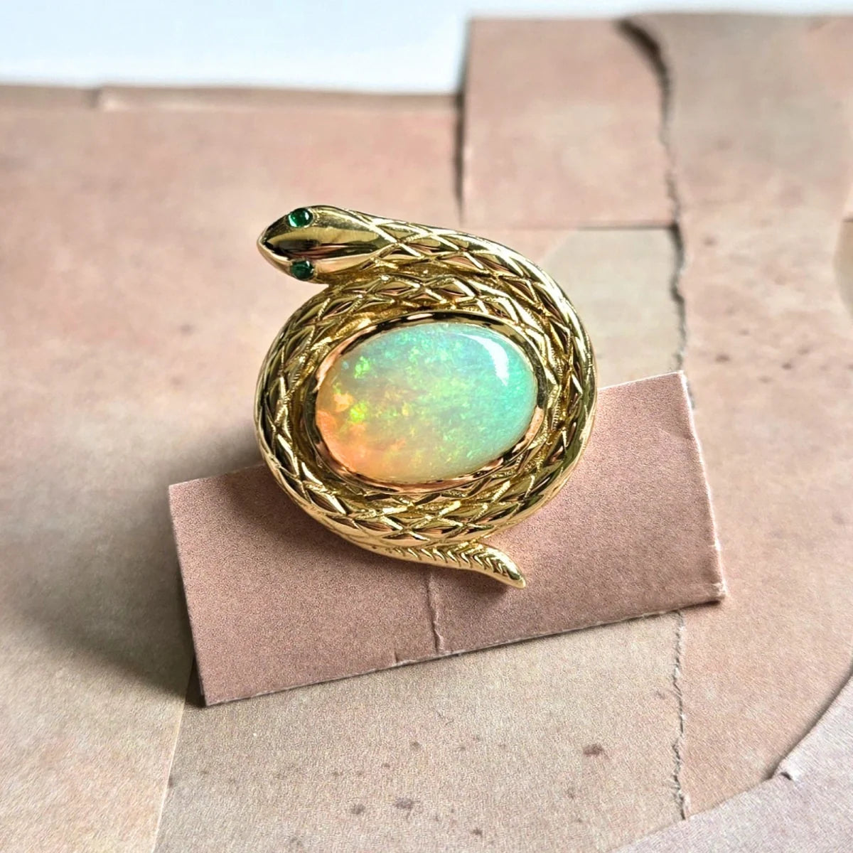 protection snake ring natural ethiopian opal emerald eyes