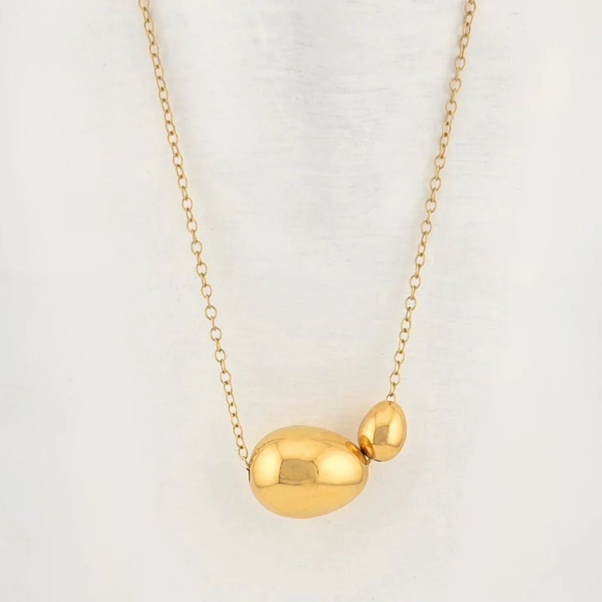 the - ora   necklace